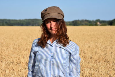 Portrait of mature man standing in field