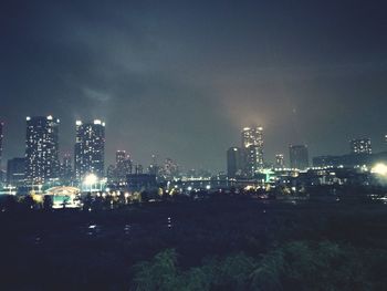 View of city lit up at night