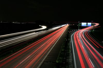 Light trails on road at night
