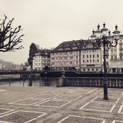View of buildings in city against clear sky