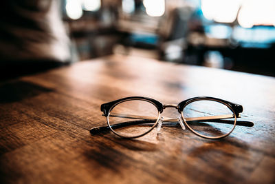 Close-up of eyeglasses on table