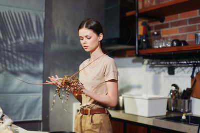 Young woman holding bouquet