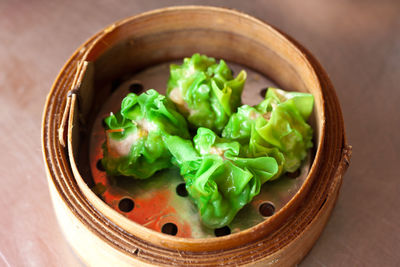 High angle view of salad in bowl on table