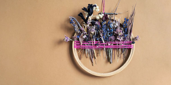 Dried flower decoration. diy floral door wreath from colourful dry summer flowers.