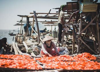 Man working at construction site against sky