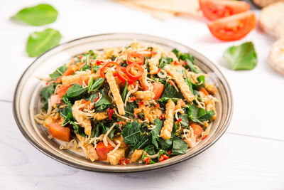 High angle view of salad in bowl on table