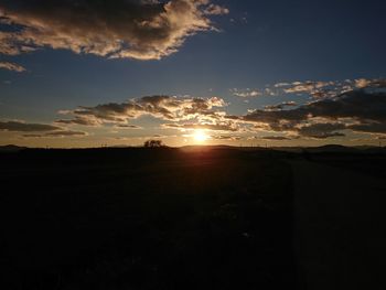 Scenic view of silhouette landscape against sky during sunset