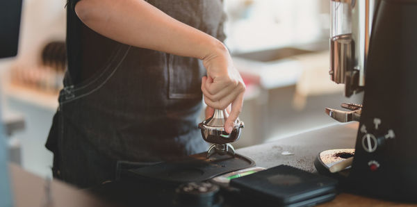 Midsection of woman working