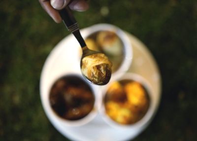 Close-up of food in spoon over plate