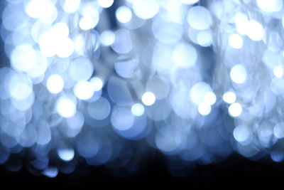 Defocused image of illuminated lights at night