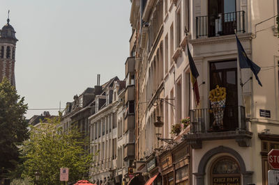 Low angle view of buildings against clear sky