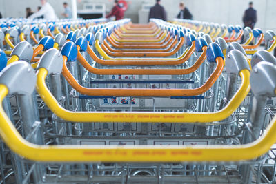 Row of luggage carts at airport