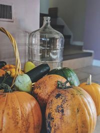 Close-up of pumpkins in basket on table