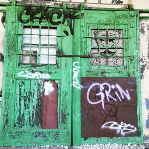 Graffiti on wall of old building