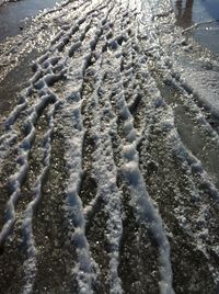 Close-up of snow on beach