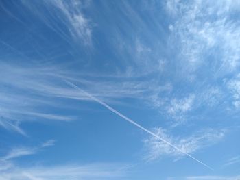 Low angle view of vapor trail in sky