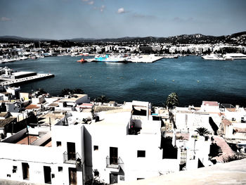 High angle view of town in front of sea