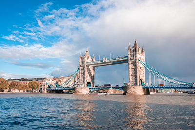 Iconic tower bridge view connecting london with southwark over thames river, uk.