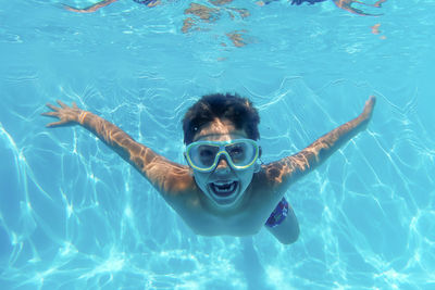 Man swimming in sea