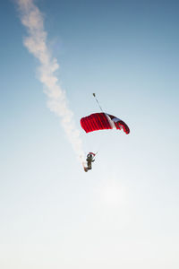 Low angle view of kite flying against clear sky