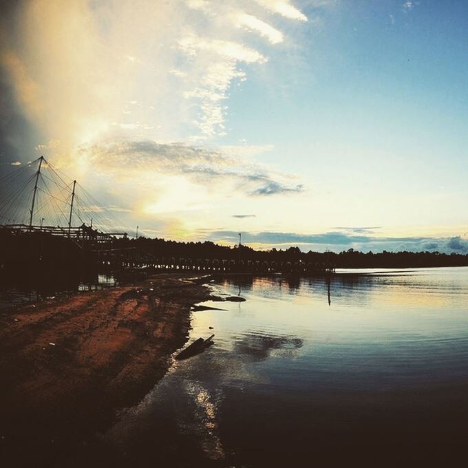 water, sky, sunset, reflection, cloud - sky, transportation, lake, river, tranquility, nature, tranquil scene, silhouette, scenics, cloud, beauty in nature, dusk, waterfront, outdoors, mode of transport, built structure