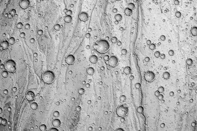 Small craters in mud volcanoes's clay river