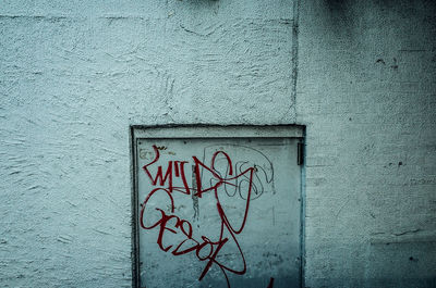 Close-up of text on wall