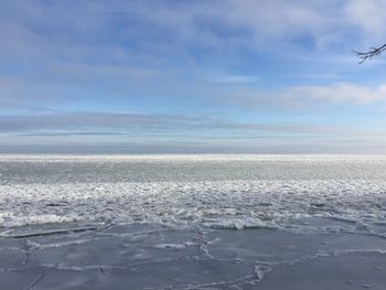 Scenic view of sea against sky during winter