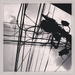 Low angle view of power lines