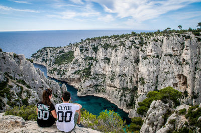 Couple overlooking rocky landscape