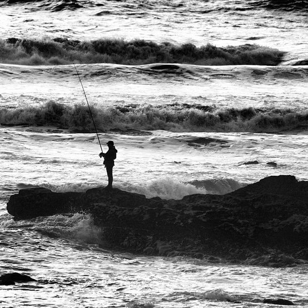 water, sea, leisure activity, wave, lifestyles, full length, silhouette, standing, surf, men, beach, shore, vacations, nature, rippled, rear view, horizon over water, waterfront