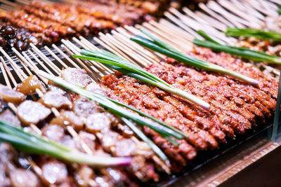 High angle view of meat on barbecue grill