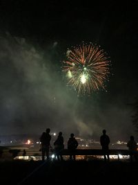 Firework display at night