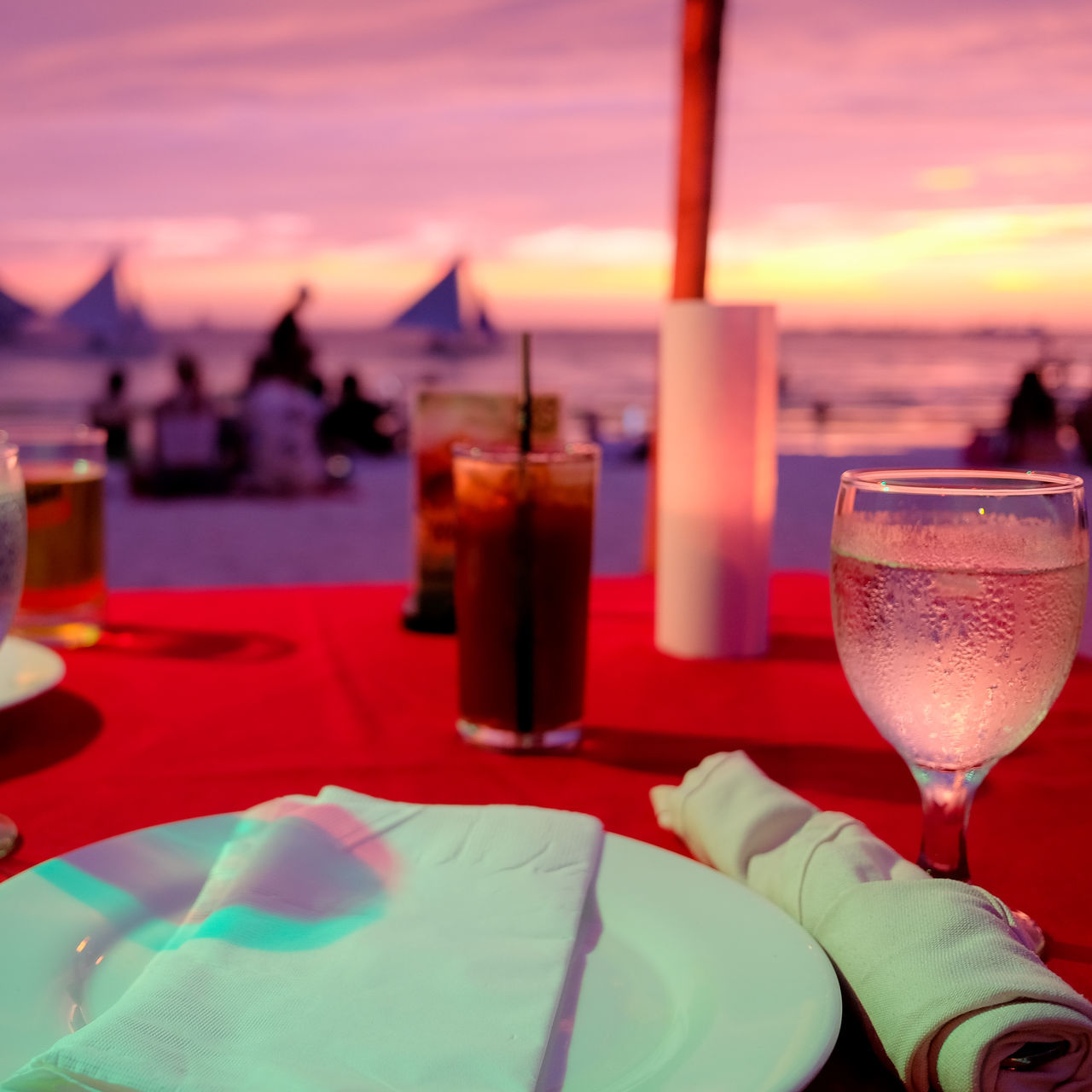 drink, alcohol, food and drink, refreshment, glass, sky, table, sunset, sea, focus on foreground, drinking glass, household equipment, cocktail, restaurant, nature, freshness, water, cloud - sky, wine, no people, outdoors