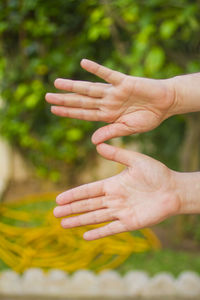 Close-up of cropped hands