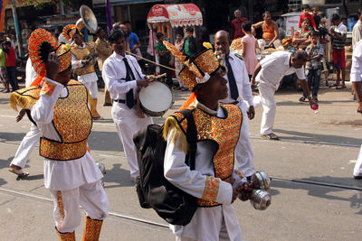 Marching band during procession at street