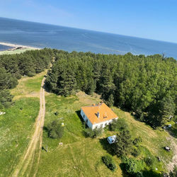 High angle view of trees by sea against sky