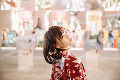 Portrait of woman looking away