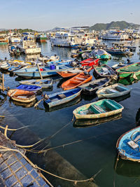 High angle view of boats moored at harbor