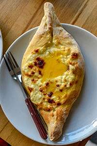 High angle view of pizza in plate