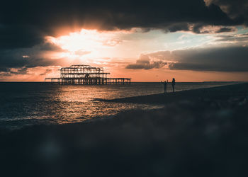 Scenic view of sea against sky at sunset