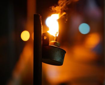 Close-up of burning candle