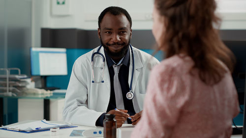 Portrait of female doctor working at clinic