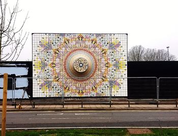 Graffiti on wall of building against clear sky