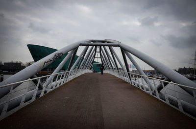 View of bridge against cloudy sky