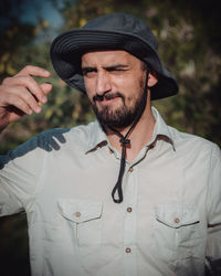 Portrait of man wearing hat