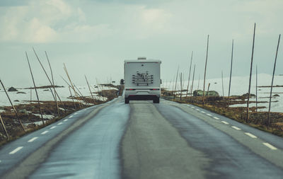 Empty road against sky