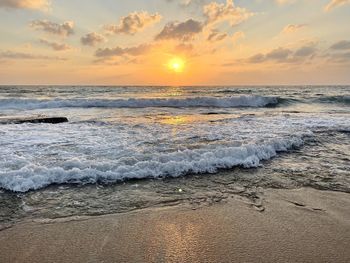 Scenic view of sea against sky during sunset