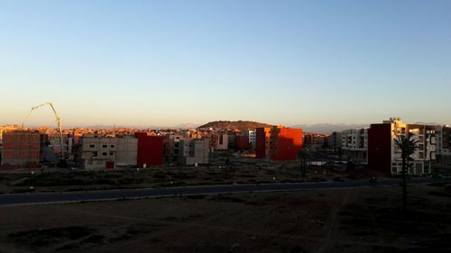 View of cityscape against clear sky