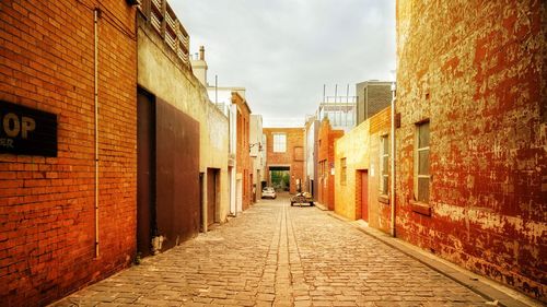 Narrow alley along buildings